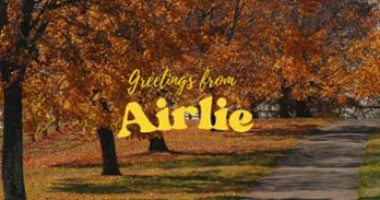 Video screenshot from a video created by SOC students that reads Greetings from Airlie.