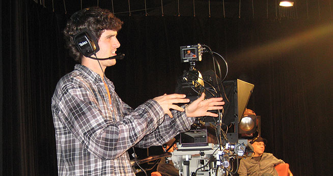 SOC Boy with headset in studio