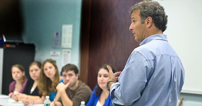 Professor Lenny Steinhorn lectures students. Stieinhorn teams with colleague Bob Lerhman to launch a political speechwriting blog, PunditWire.