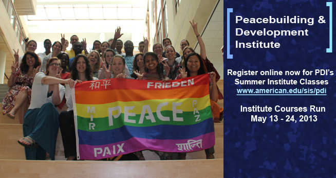 PDI students holding peace flag.
