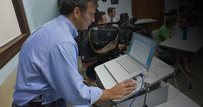 Person looking at information on laptop