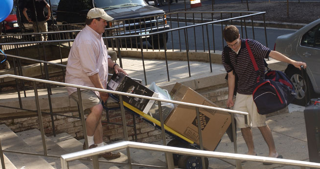 Student moving into a dorm