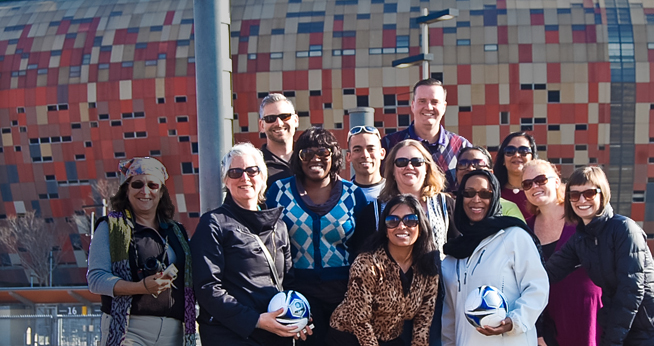 Students visit a soccer stadium in South Africa