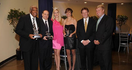 From left, 2009 Alumni Award winners Tom Lewis, '75, and Robert Cerasoli, '69, with Miss D.C. 2009 Jen Corey, '05; Award winner Lindsay Webster,&nbsp; '03; Pres. Neil Kerwin, '71; and Alumni Board Pres. Brian Keane,'89. Photo by: Hilary Schwab.