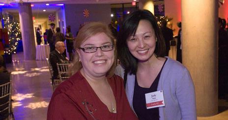 Ashley Philips, SOC/BA '02 & SOC/MA '03, and Judy Park, SOC/MA '03 at the annual Holiday Soiree