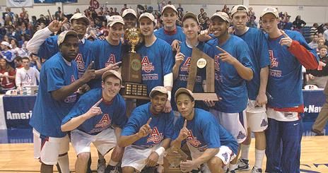 Men's Basketball Team with trophy, photo by Jeff Watts.