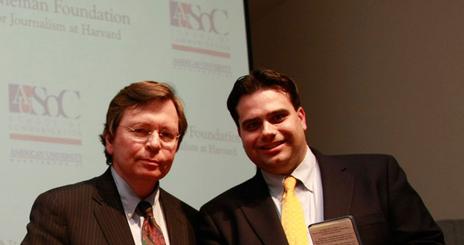 Student award recipient Russ Choma at the Nieman Foundation Awards ceremony with Chuck Lewis.