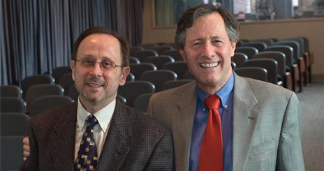 School of Communication professor Chris Palmer and alumnus Michael Cascio in the Wechsler Theater.