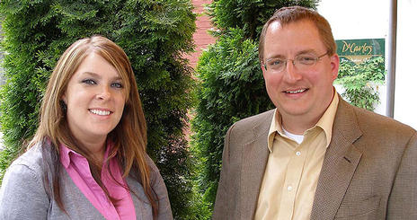 Elizabeth Nicolet, who won the award for best case analysis for her study of the rhetoric of South Park, with conference sponsor Doug Wendt, SOC/MA '07, founder and CEO of Wendt Partners