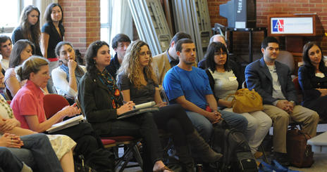 Graduate students attending a lecture.