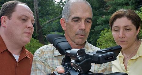 Professor Larry Engel gives tips to students on using the SONY Ex-1 camera as they prepare for Classroom in the Wild: Alaska
