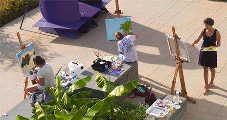Students painting on Katzen plaza