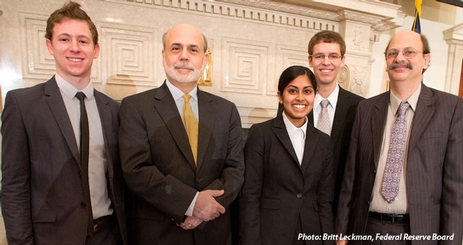 AU students Zachary Smith, Ayesha Cooray, and Peter Blankenship after accepting award with Federal Reserve Chairman Ben Bernanke and Professor Evan Kraft.