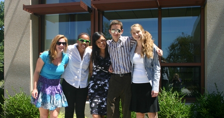 Community of Scholars students in front of the SIS building.