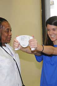 A student receives a health screening at the Health Center.