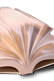 Pages in a book fanned open and being flipped through