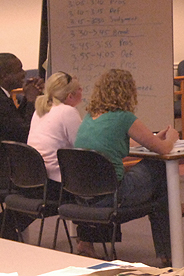 People participating in a mock trial held at the Washington College of Law
