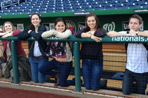 The Green Eagles take a break in the Nationals dugout during a tour of the green features of the LEED-certified ballpark