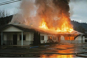 Firebombed building in flames