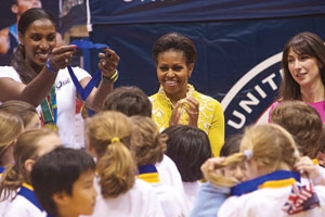 Michelle Obama with Olympian Lisa Leslie and Samantha Cameron, wife of British prime minister David Cameron.