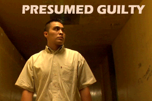 Image of Mexican man walking down jail hallway