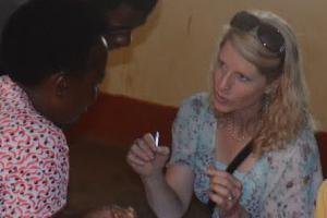 Katie Holton talking with Kenyan villager