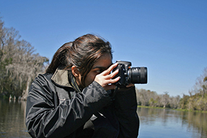A student photographs animals in the Everglades during classroom in the Wild 2009. Photo by Joe Bohannon