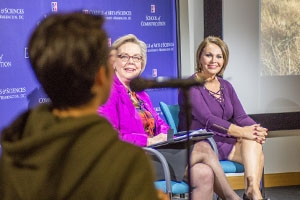 Maria Elena Salinas and Jane Hall on stage during a screening of Risking it All taking a question from a student.