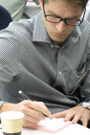 Professor takes notes