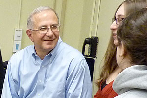 Pollster Geoff Garin speaks with Political Communication students after guest lecturing on using polling in strategic campaign planning.
