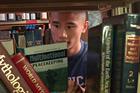 Student looking for books.