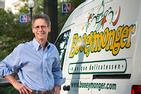 Photo of Ron Vogel next to Booeymonger van.