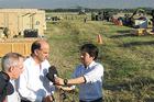 Ambassador to Haiti Kenneth Merten talks with reporters after the earthquake.