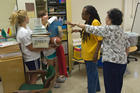 During the Freshman Service Experience in 2008, students helped teachers at Bancroft Elementary School get ready for the school year.