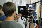 High school students learn filmmaking skills through the Discover the World of Communication program. 