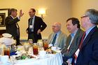 Photo: Wendell Cochran, Charles Lewis, and Larry Kirkman at the Investigative Reporters and Editors Conference luncheon sponsored by AU. In the background, Mark Horvit, right, and Brandt Houston