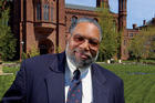 Lonnie Bunch in front of the Smithsonian Castle.