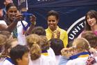 Michelle Obama with Olympian Lisa Leslie and Samantha Cameron, wife of British prime minister David Cameron.