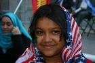 Muslim girl with American flag.