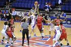 Women's basketball team on the court.