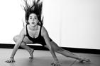 Dancer lunging with hair flying up