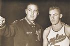 Photo: Coach Dutch Schulze with one of his players.