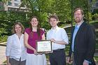Photo: From left, Anna Olsson of CTRL, students Allie Dart, Matt Lehtonen, and Director of Sustainability Christopher O'Brien.