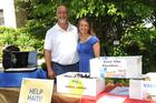 Randall Childers and his daughter, Heather Smith, collect sunglasses, vitamins, and more during Staff Appreciation Day.