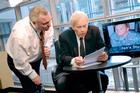 SOC Professor Rick Rockwell and XM radio host and SOC alum Bob Edwards review a script for the public television special, Homefront
