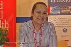 International Media Student Leila Hernandez staffs the "Rockford, Illinois" booth at the Paris Air Show.