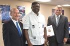 From left: SIS dean Lou Goodman, Nathaniel Kwabo and Bill Mayer