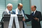 Dean Louis Goodman was presented with a doctor honoris causa in humane letters, by Rector John Maresca, left, and Vice Rector Amr Abdalla, center, of the University of Peace.