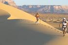 Runners in the Sahara Desert