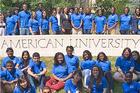 Incoming freshman in the STEP program gather at the Massachusetts Avenue entrance to AU.